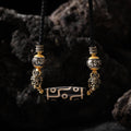 Dzi Necklace Om and Skull Charms